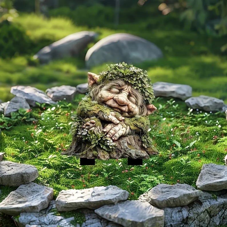 Fairy Tale Acrylic Garden Stake with a dozing troll on a mossy stump detail