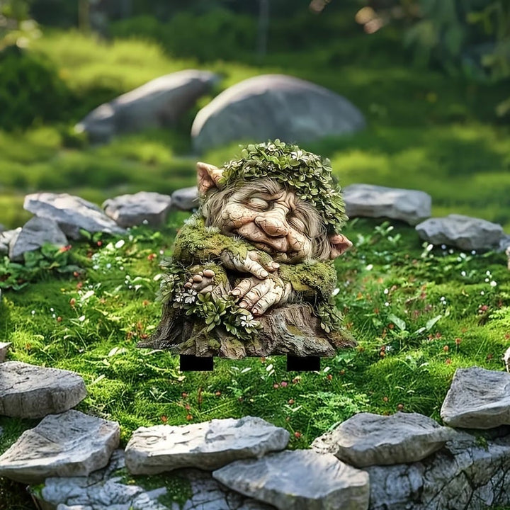 Fairy Tale Acrylic Garden Stake with a dozing troll on a mossy stump detail
