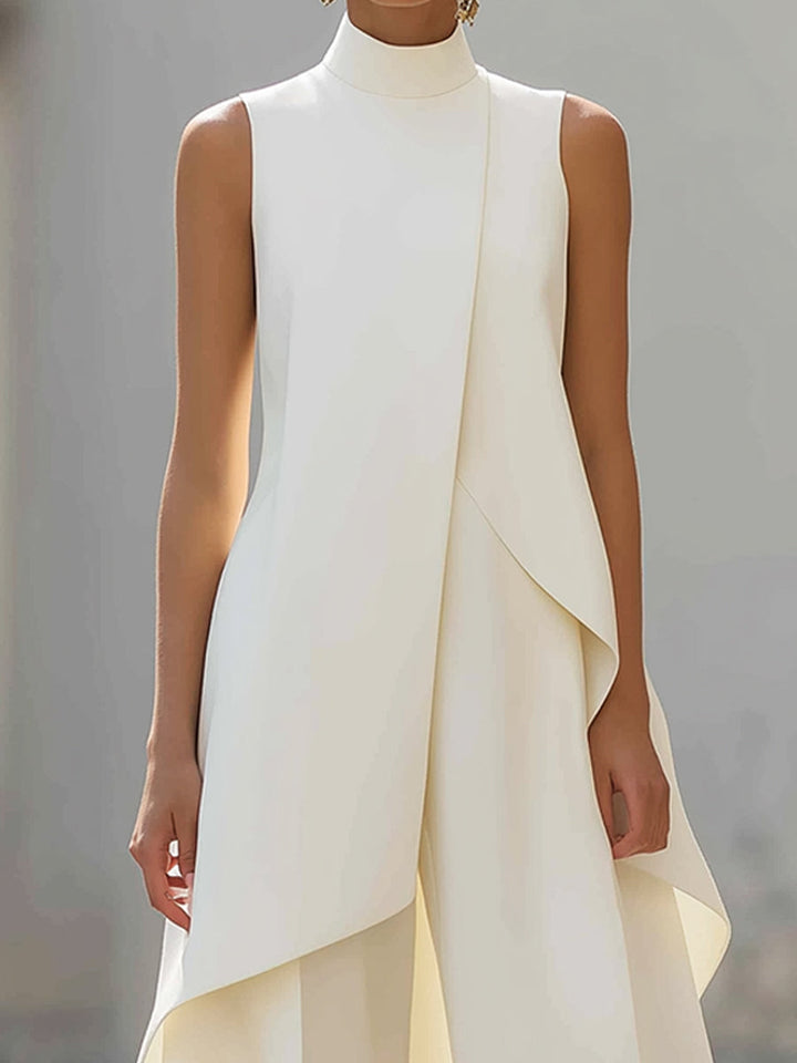 Close-up of the cream Women's Two-Piece Asymmetric Top and Wide-Leg Pants Set top with mock neckline and curved hem.