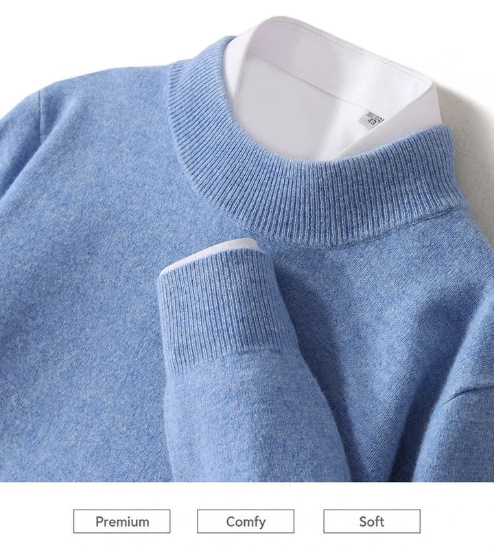 Close-up of the light blue ribbed mock neckline and cuff with a white shirt collar underneath 4