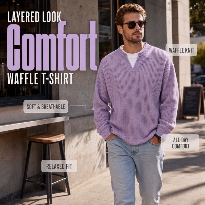 Man in sunglasses and jeans walking past a cafe in the lavender waffle knit top over a white tee 1