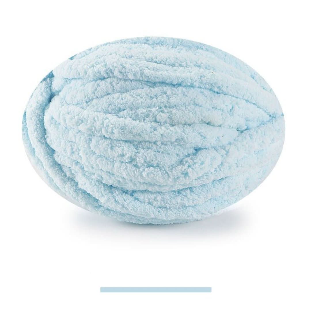 Oval ball of fluffy chunky yarn in pale sky blue, with a matching color swatch bar below. 22
