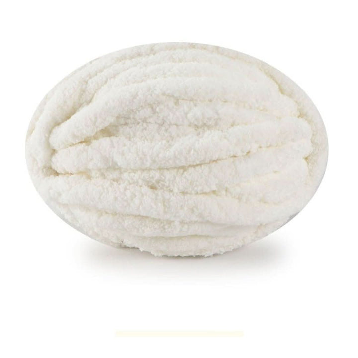 Single oval skein of creamy white chunky yarn on a white background, with a faint swatch bar below.