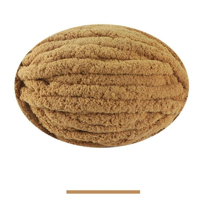 Single oval skein of caramel brown chunky yarn on a white background, with a color swatch bar below.