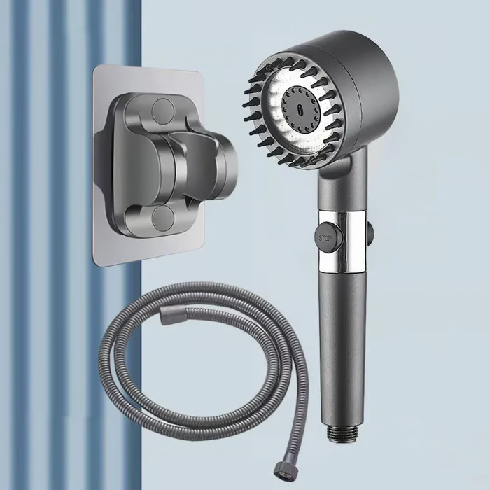 Gray shower head with bristled face displayed with its adhesive wall bracket and a coiled gray hose against a blue-gray background. 6