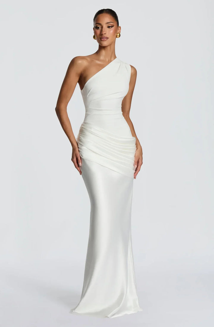 Sidonie One-Shoulder Draped Satin Maxi Dress in white, front view with the pleated bodice, hip drape and satin skirt.