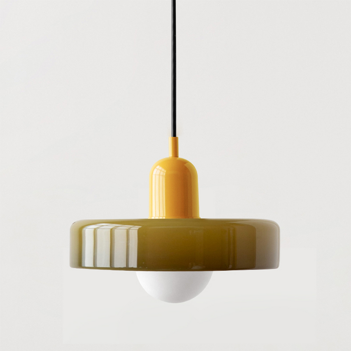 Olive glass pendant with a yellow cap and a frosted globe bulb on a plain light background 19