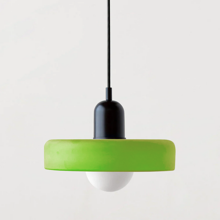 Lime green disc pendant lamp with a matte black cap and black cord, front view 54