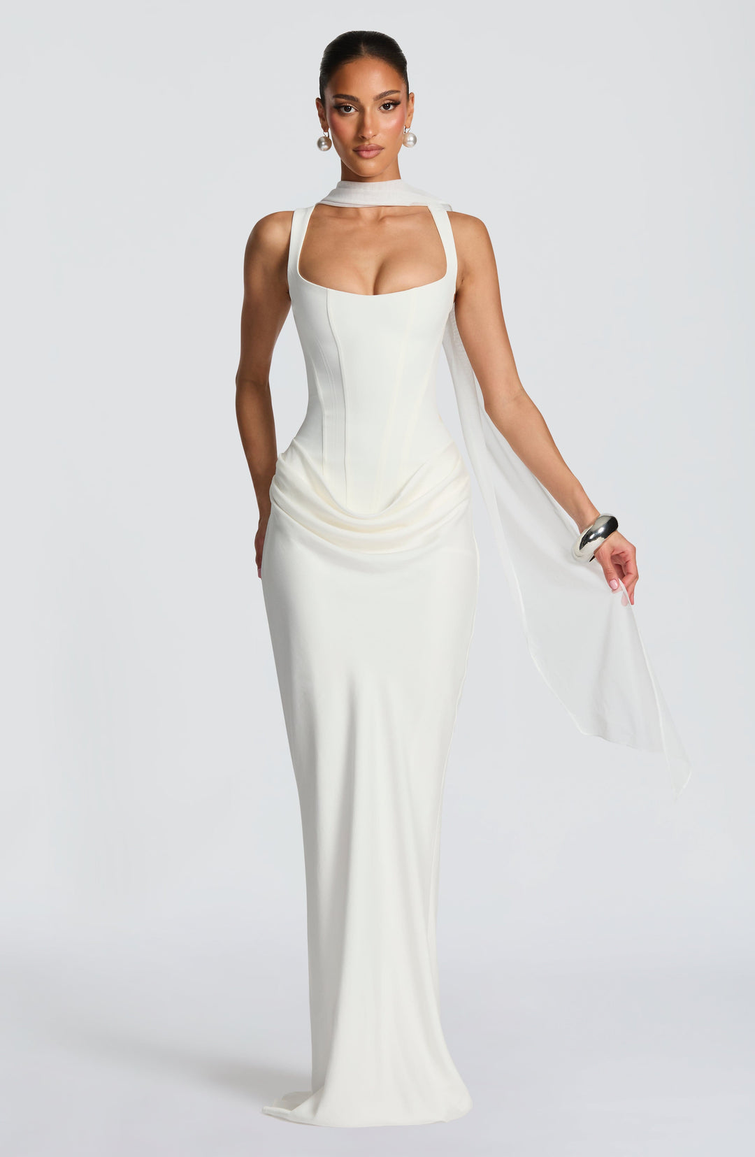 Indy Bodycon Maxi Dress in cream white styled with a sheer scarf around the neck and one arm.