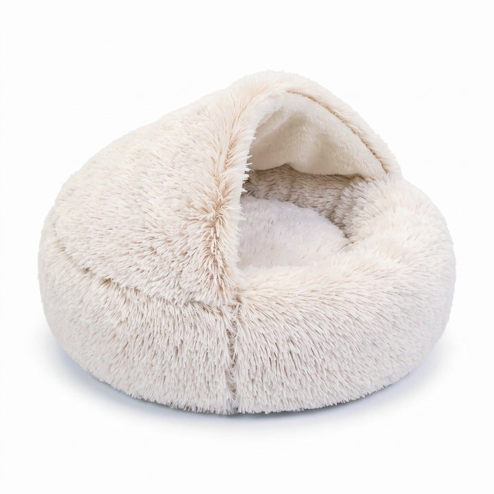 Cream plush hooded cave bed with soft white interior