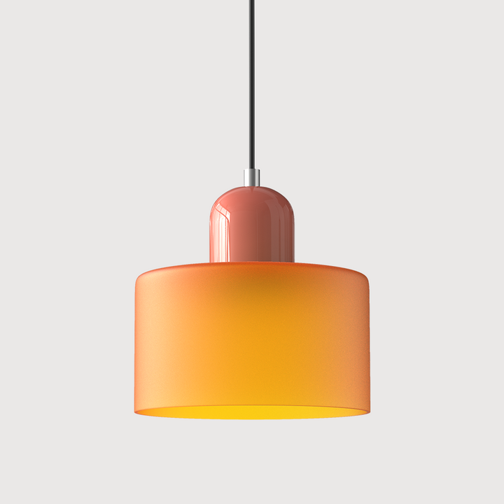 Frosted orange glass drum pendant light with a coral cap and black cord on a plain light background. 18