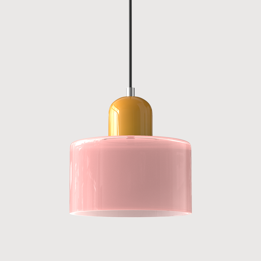 Pink glass drum pendant light with a mustard yellow cap and black cord on a plain light background. 10