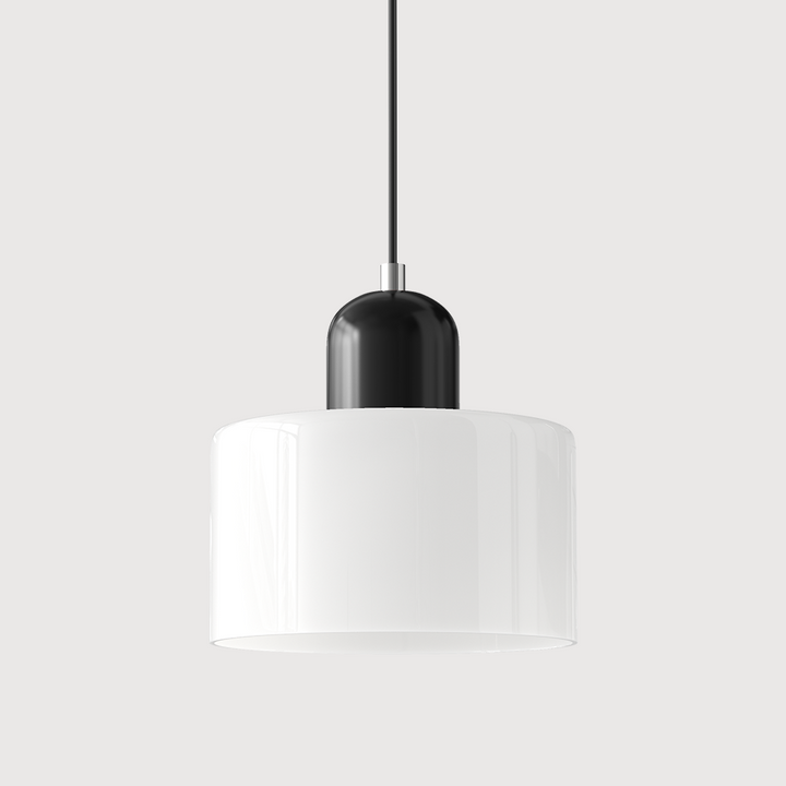 Pendant lamp with a glossy white drum glass shade, a glossy black capsule cap and a black cord. 27