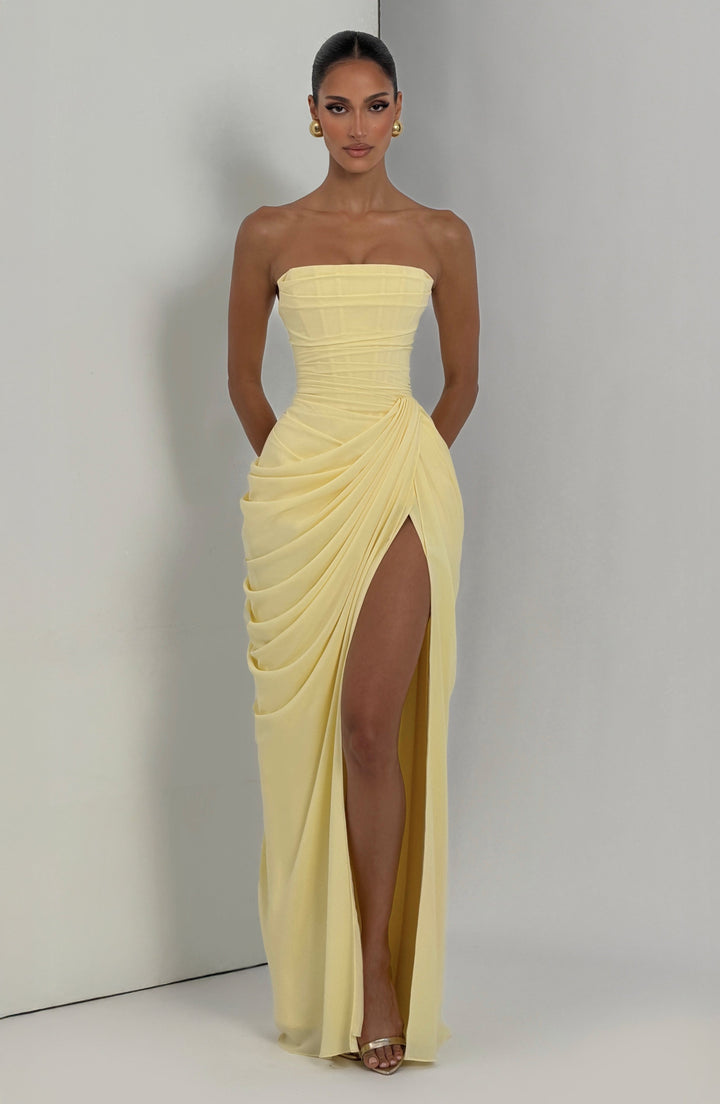 Lois Strapless Corset Maxi Dress with High Slit in pale yellow, front view