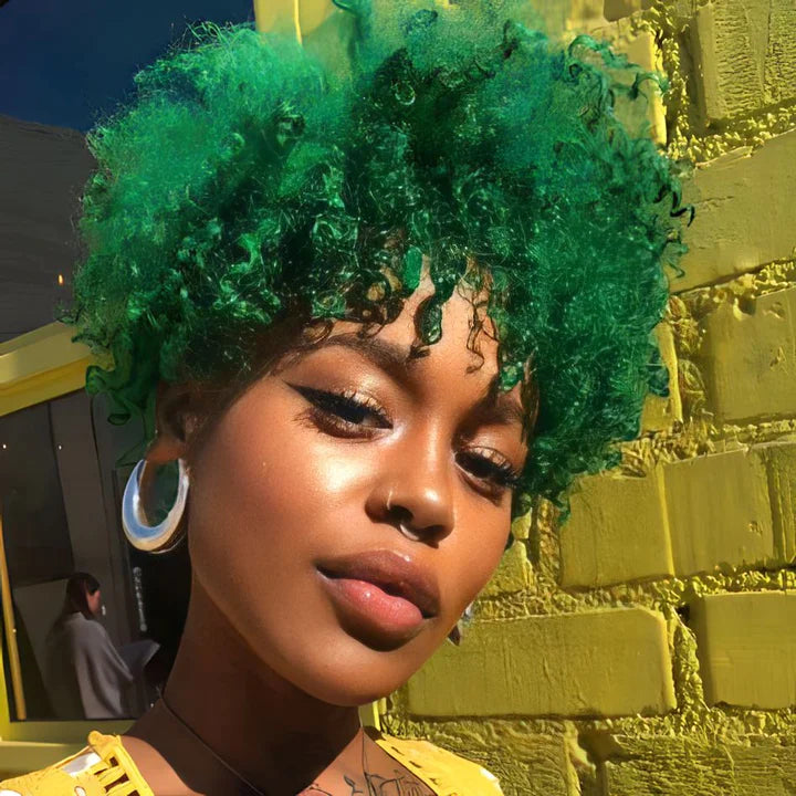 Another view of a short, textured curly cut in rich emerald green.