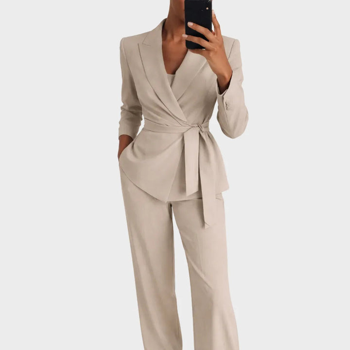 Women's matching blazer and pants set in beige, shown in another view with a wrap front and tie belt.