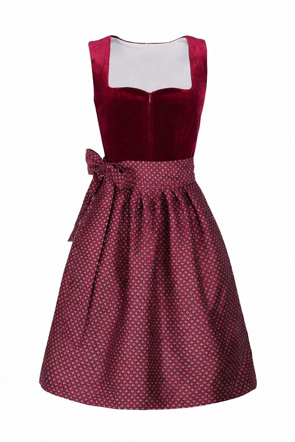 Front view of the burgundy velvet dirndl with a patterned jacquard apron tied in a side bow over the skirt.