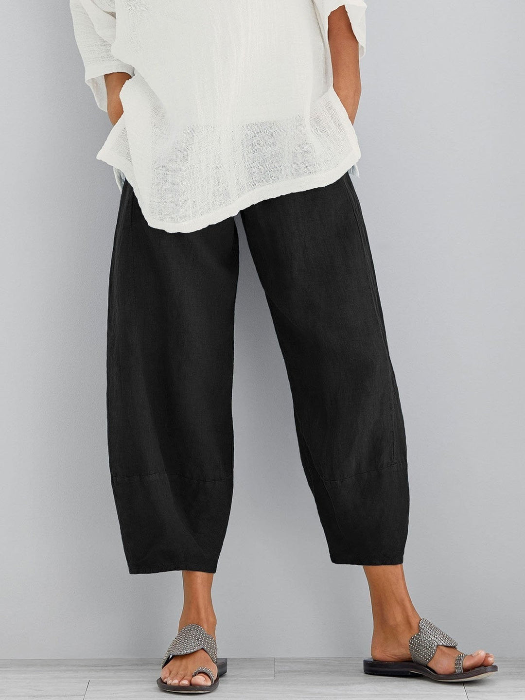Black cropped wide-leg pants with an elastic waist, another view