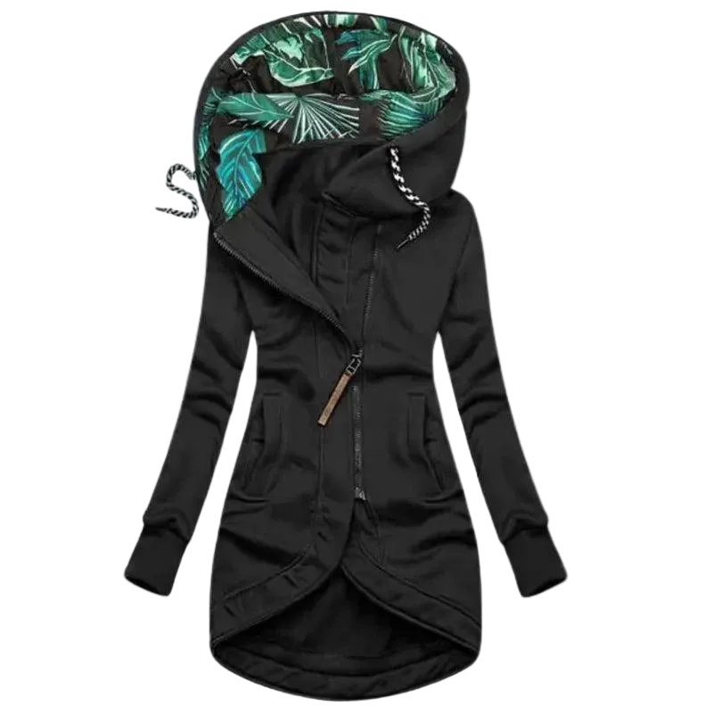 Black version of the long hooded jacket, front view, with leaf-print hood lining, diagonal zipper, side pockets and curved hem.