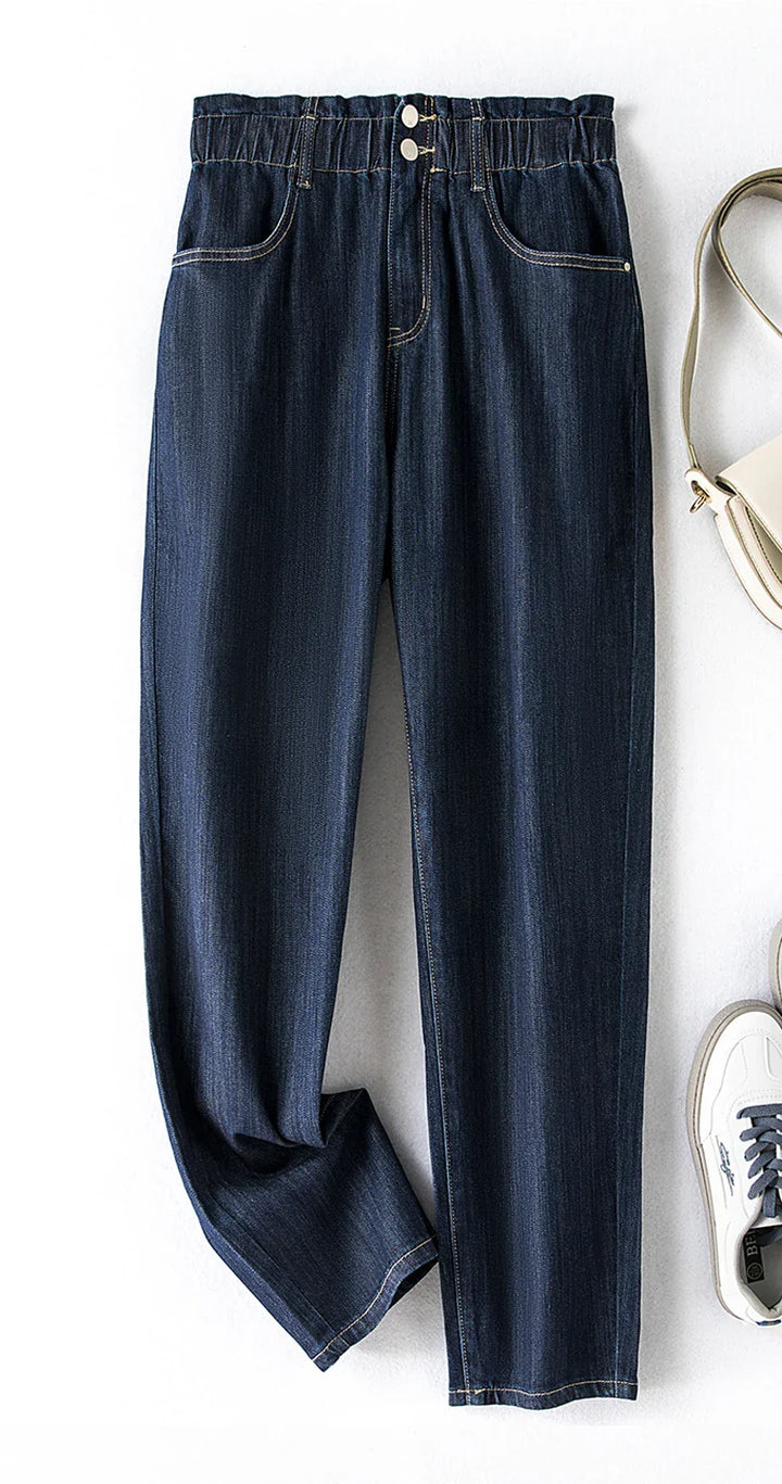 Dunkelblaue Damenjeans mit elastischem Bund, lässiger Stil, aus Denim, modisch und bequem.