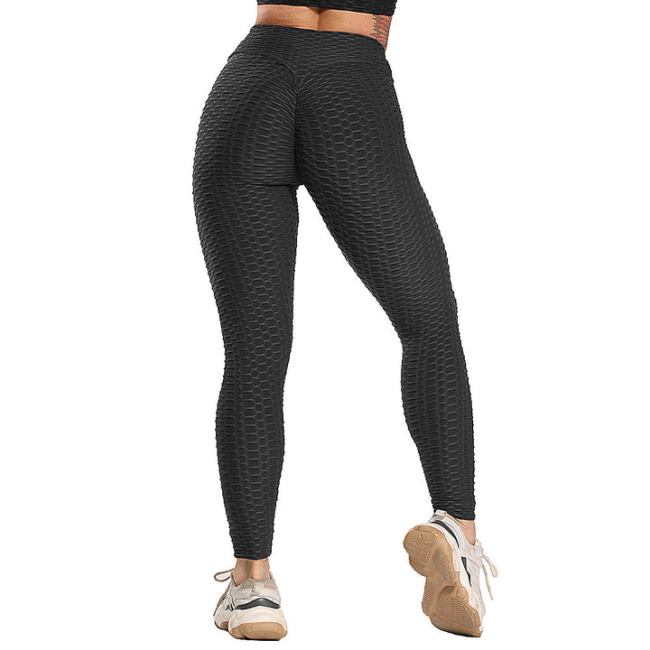 Damen Sportleggings schwarz, nahtlos, strukturierte Textur, hohe Taille, Fitnessmode.