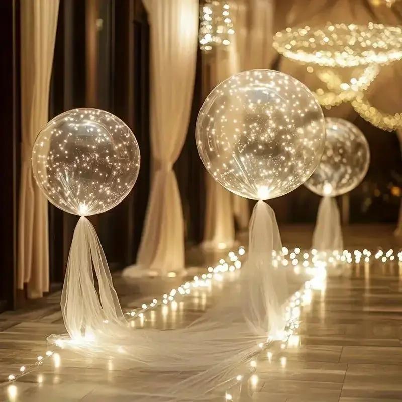 LED Balloon Set (10 Pack) another view of lit balloons in an indoor aisle