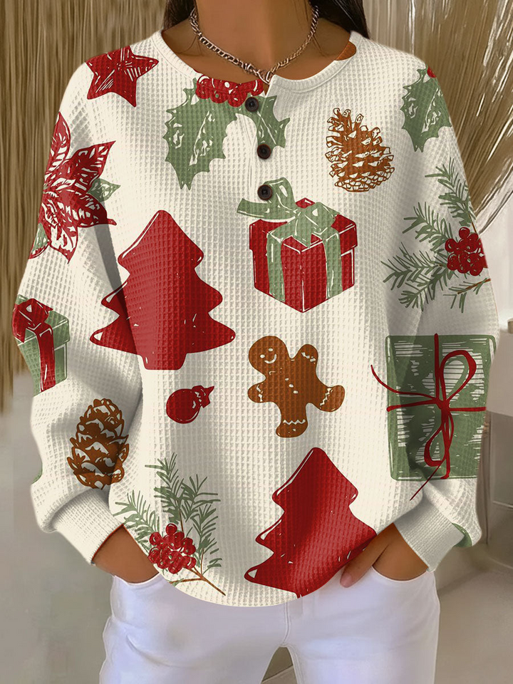 Cream waffle knit henley sweater printed with red and green Christmas trees, gifts, holly, pinecones and a gingerbread man 23