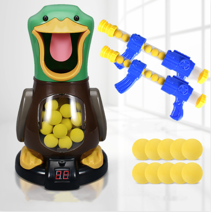 Duck target with a score display, two blue poppers and ten yellow foam balls laid out 6