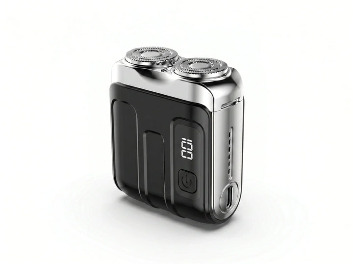 Black compact twin-head shaver with chrome top, digital display and USB-C port from another view.