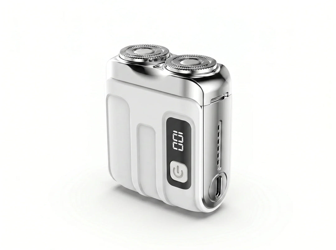 White compact twin-head shaver with chrome top, digital display and USB-C port from another view.