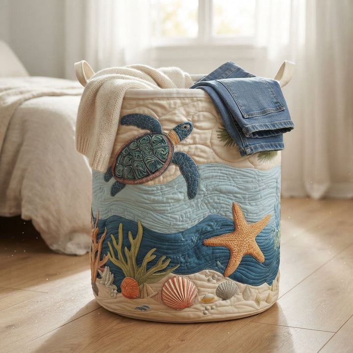 Quilted laundry basket with canvas handles in another view beside a bed.