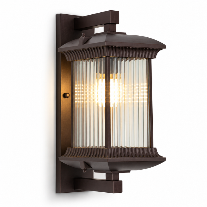 Weatherproof outdoor wall light with a brown metal frame and ribbed glass panels, shown at an angle on white.