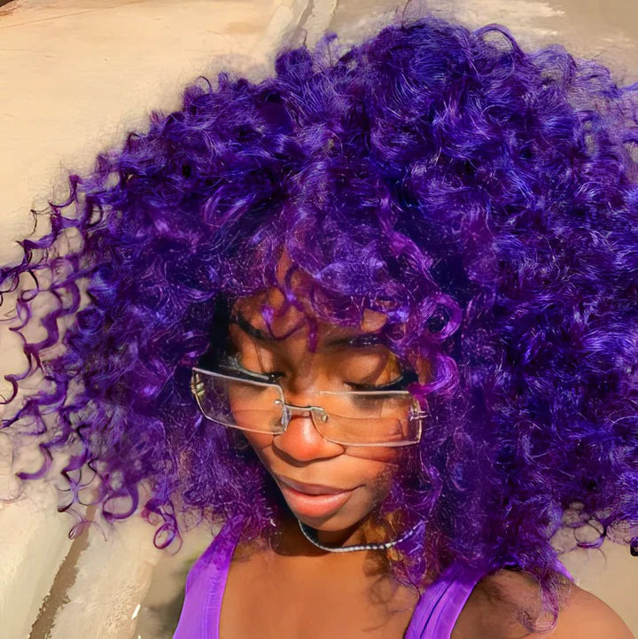 Another view of curly hair in deep violet purple with rimless glasses.