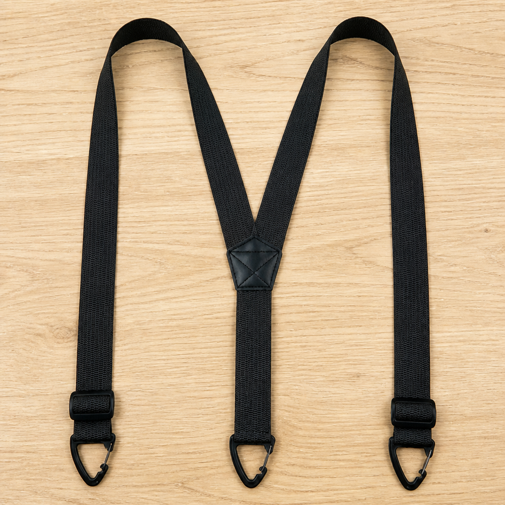 Black Y-back suspenders laid flat with three black triangular clips and a center patch.