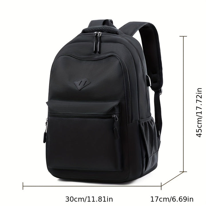 Black backpack with dimension lines marking its height, width and depth in centimeters and inches.