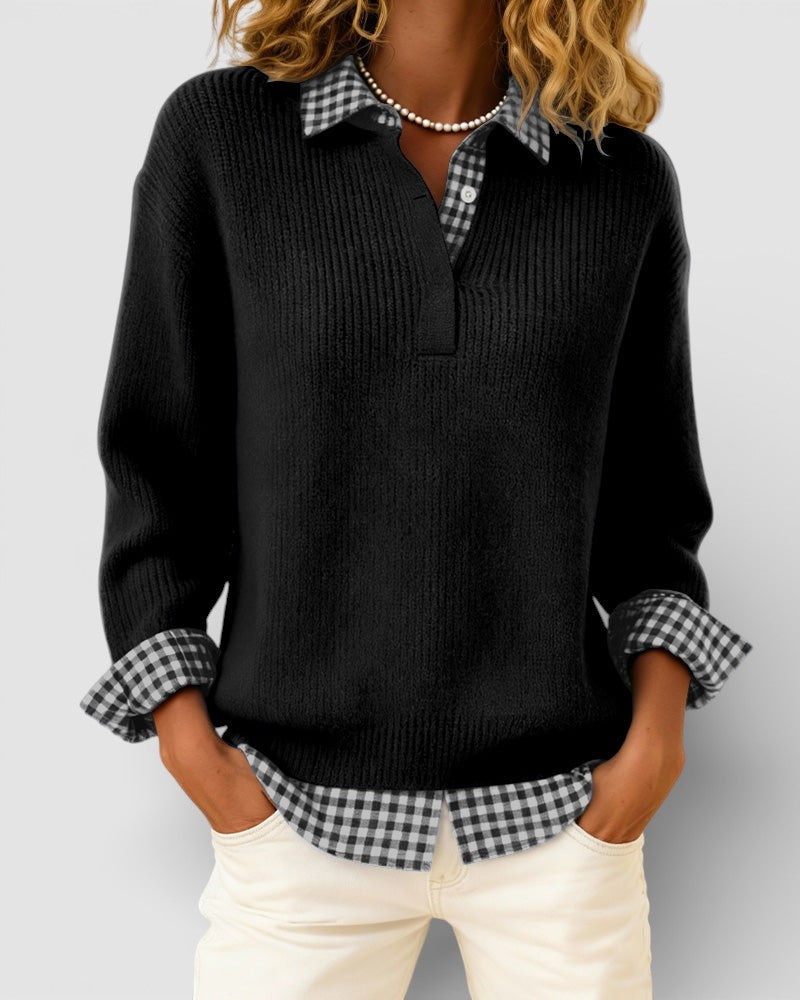 Black ribbed knit sweater over a black and white gingham shirt on a model.