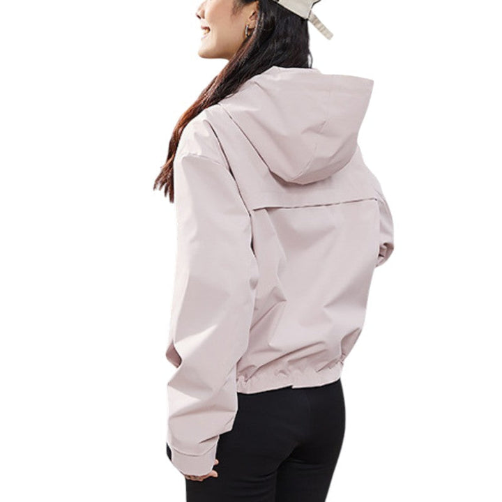 Back view of the pink jacket showing the hood, yoke seam and gathered elastic hem. 12