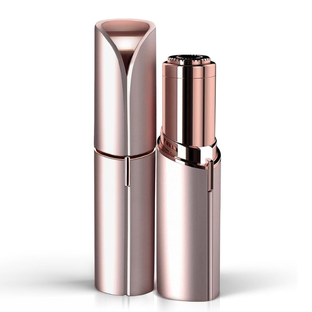 Facial hair remover in a pearly rose gold finish, shown capped beside the uncapped unit with its round shaving head.