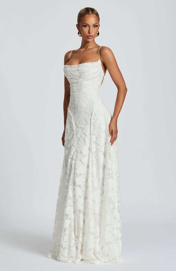 Elise Gingham Dress in white with a fitted bodice and long flowing skirt, angled front view.