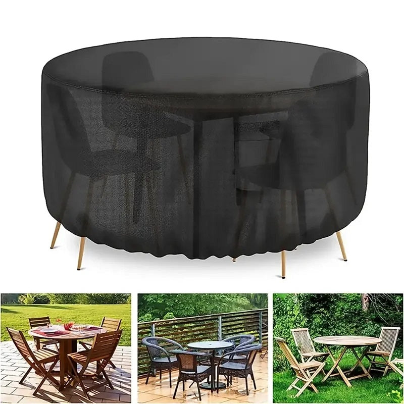 Black round patio furniture cover with a faint outline of chairs underneath.