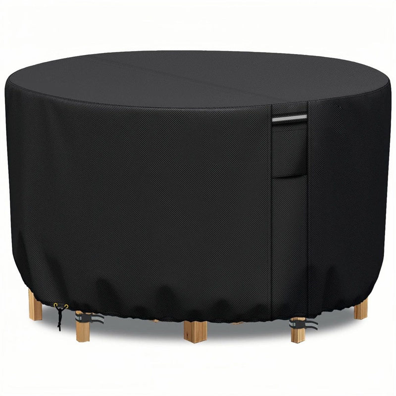 Front view of a black round patio furniture cover with a vertical handle strap, drawstring and buckle straps.