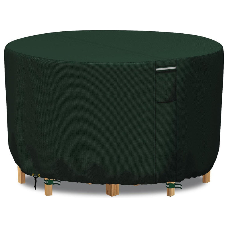 Front view of a green round patio furniture cover with a vertical handle strap, drawstring and buckle straps.