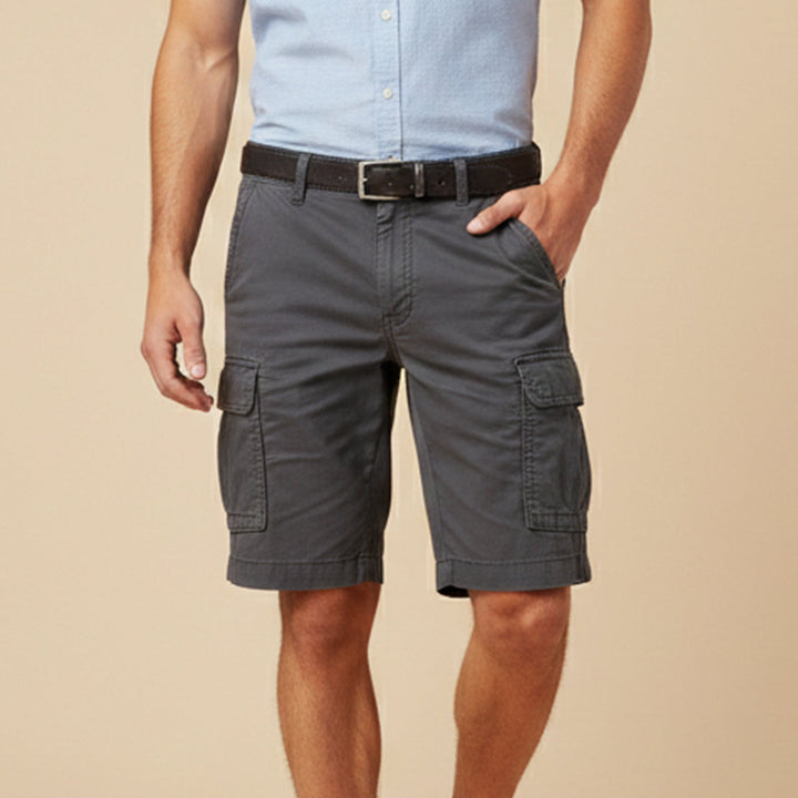 Model wearing men's grey cargo shorts, another view