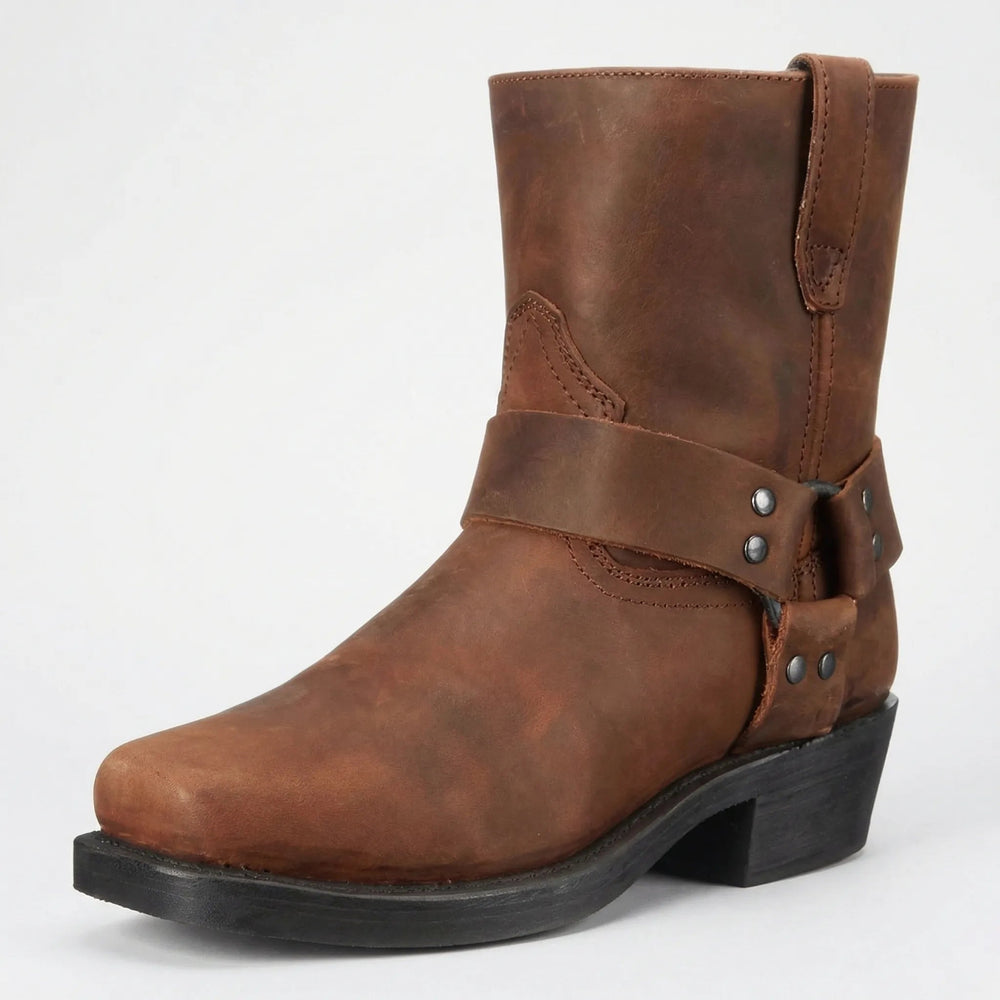 Brown leather mid-calf boot with a studded harness strap and square toe, shown at a three-quarter angle on a light background. 2