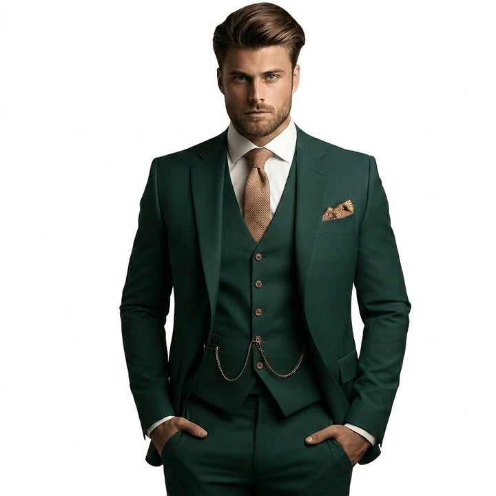 Model with hands in pockets wearing the suit in deep forest green, with a copper-tan tie and pocket square. 5
