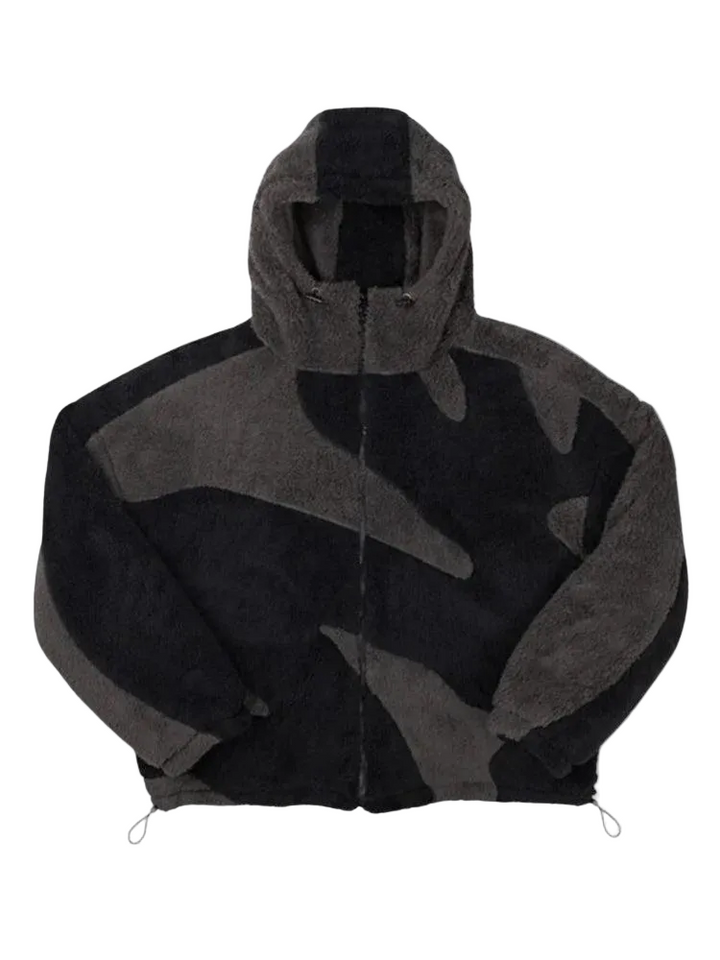 Front view of a zip-up fleece hoodie in black and charcoal gray with large abstract panels 1