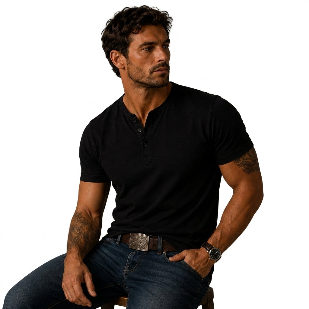 Black short sleeve top as another view, worn seated with jeans and a brown belt.