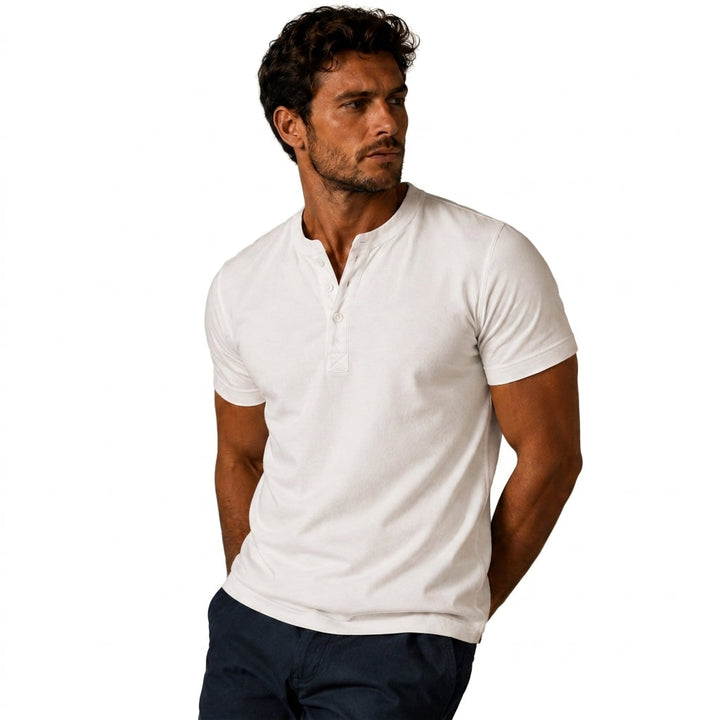 White short sleeve top as another view, worn with dark navy pants.
