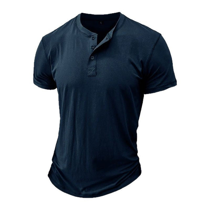 Navy short sleeve top with three-button placket and collarless round neckline, shown flat on a white background.
