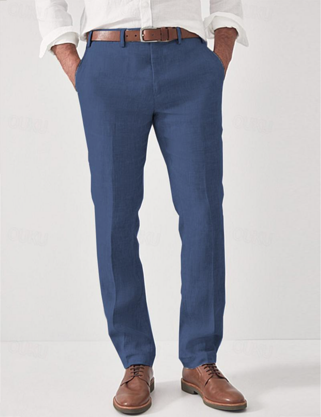 Men's linen pants in medium blue with a brown belt, detail